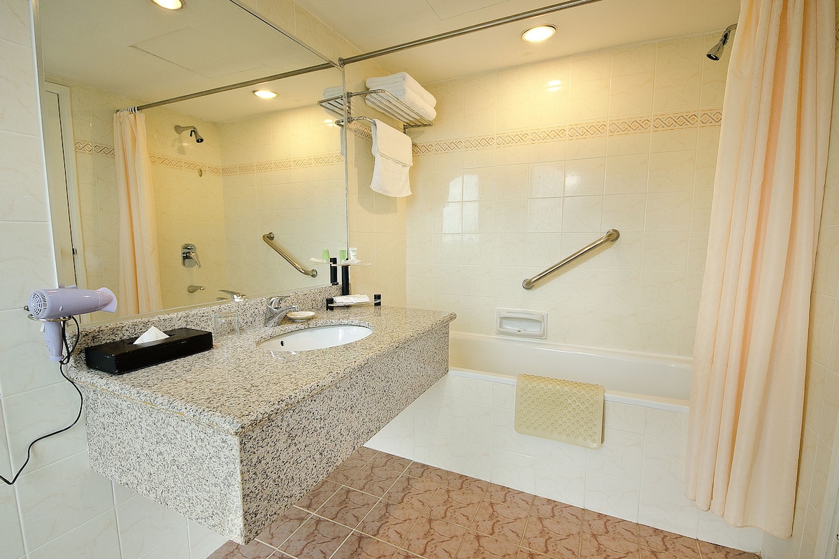 shower, free toiletries, slippers, bidet