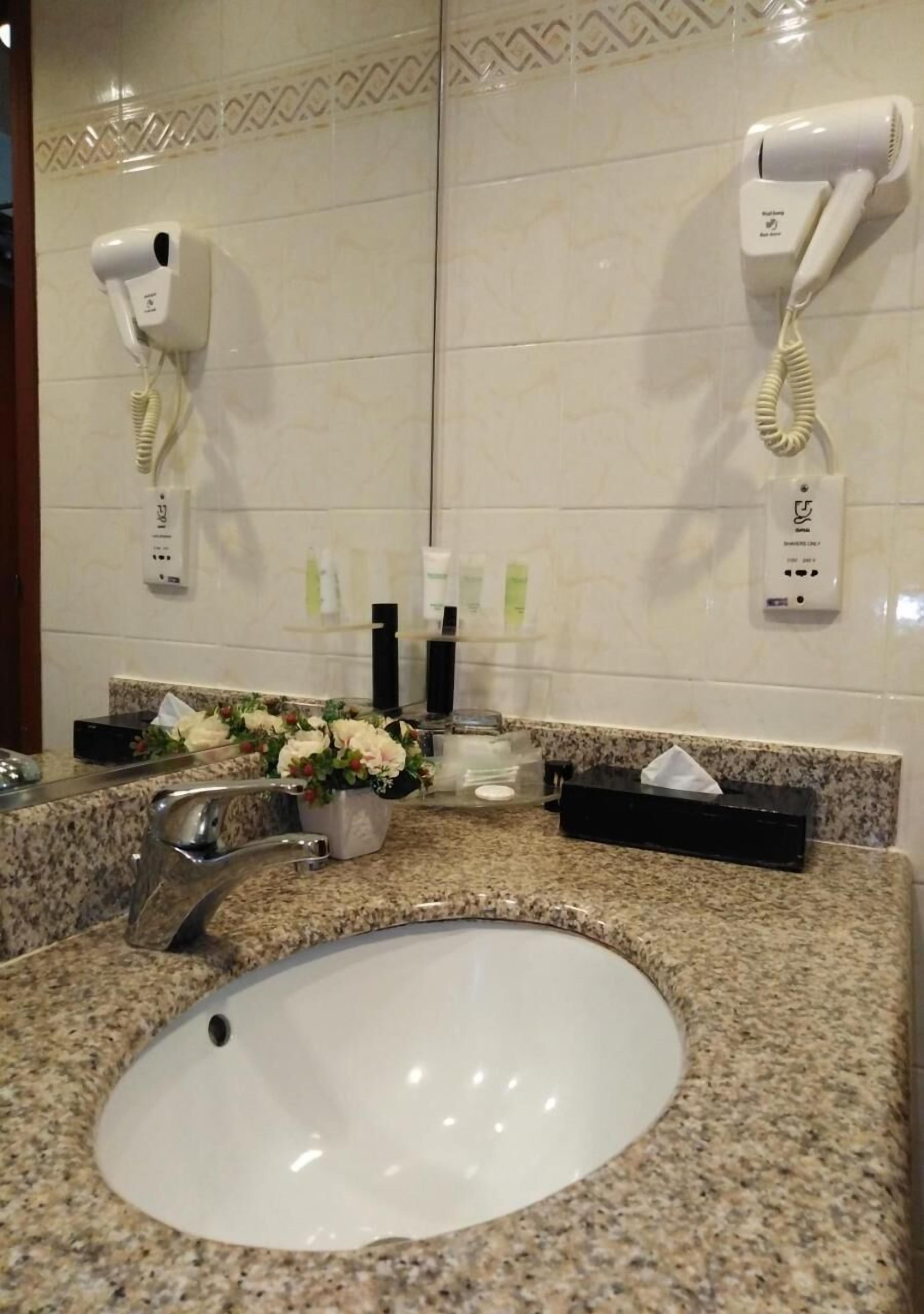 shower, free toiletries, slippers, bidet