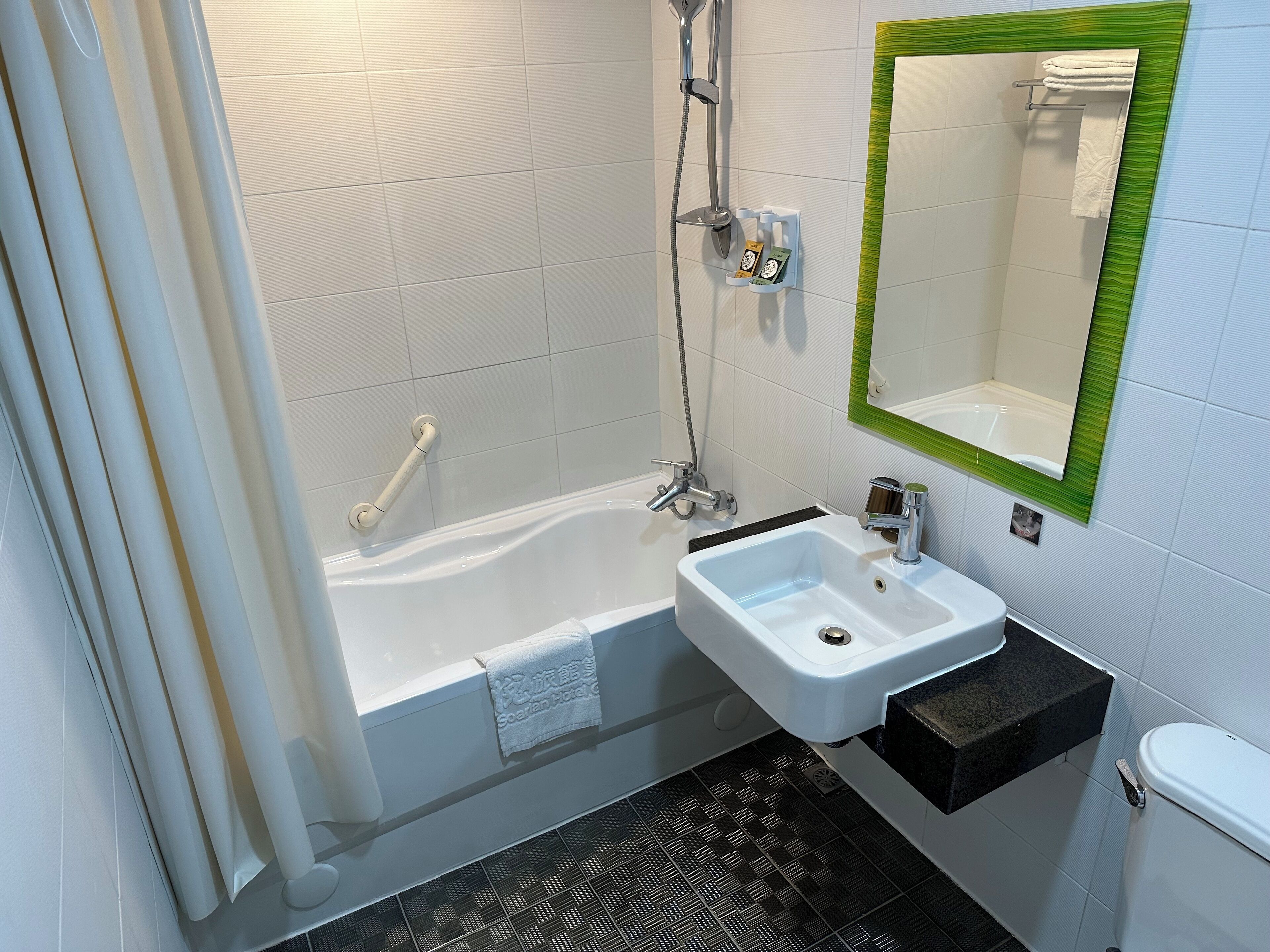 free toiletries, hair dryer, slippers, towels