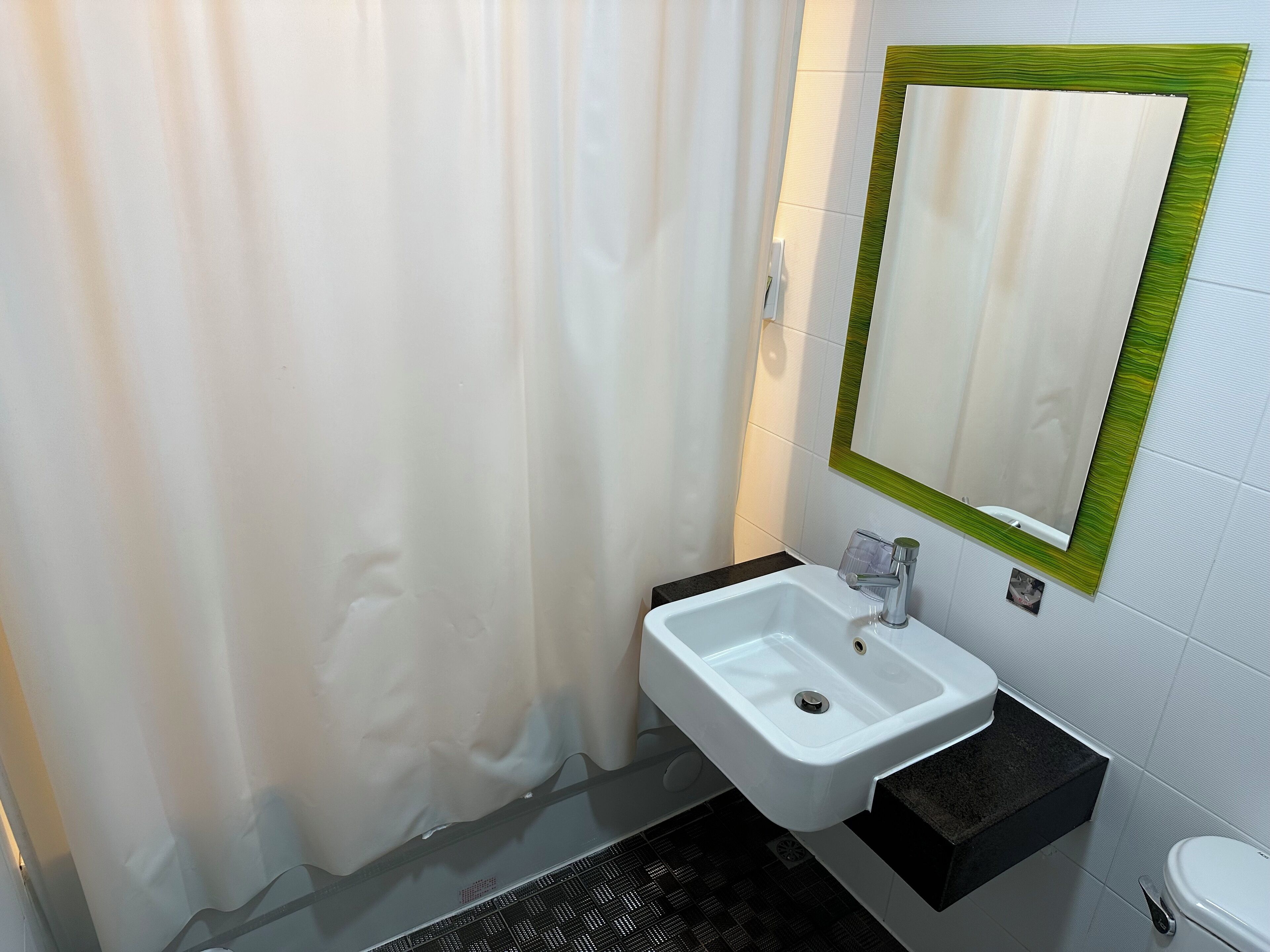 free toiletries, hair dryer, slippers, towels