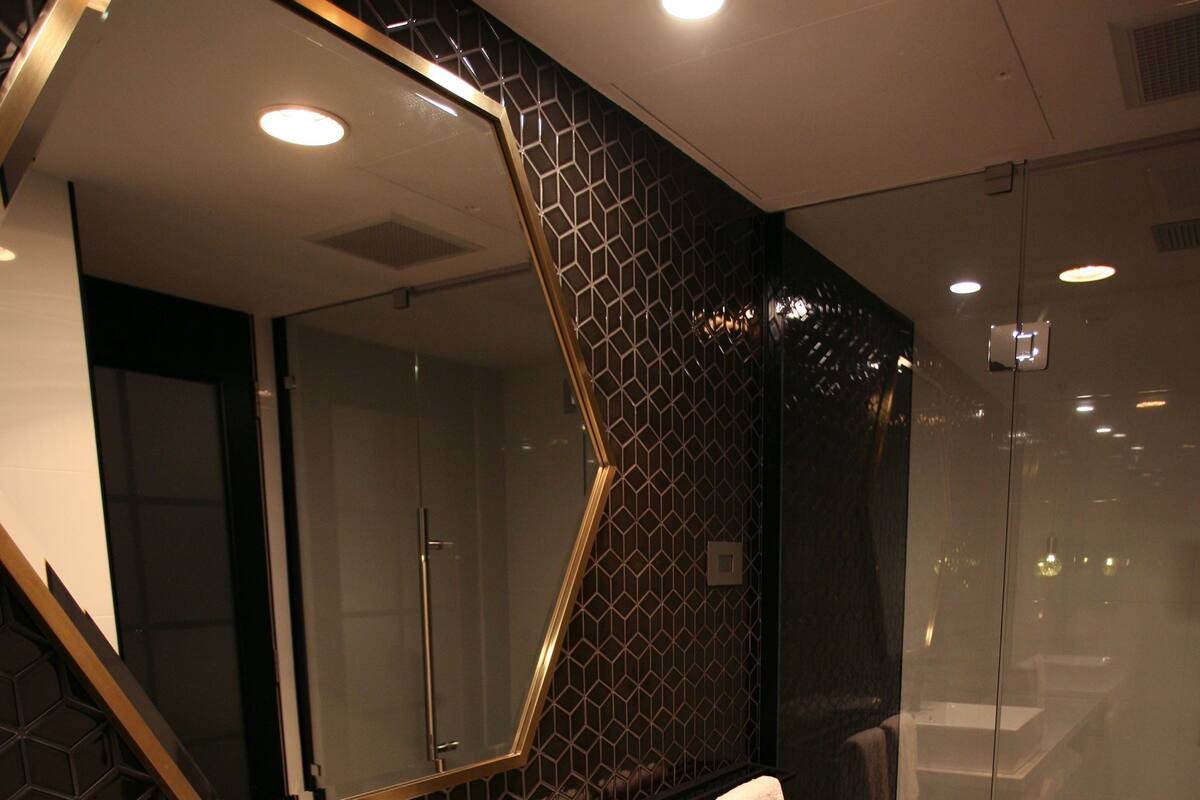 luxe suite | bathroom | shower, designer toiletries, hair dryer, bathrobes