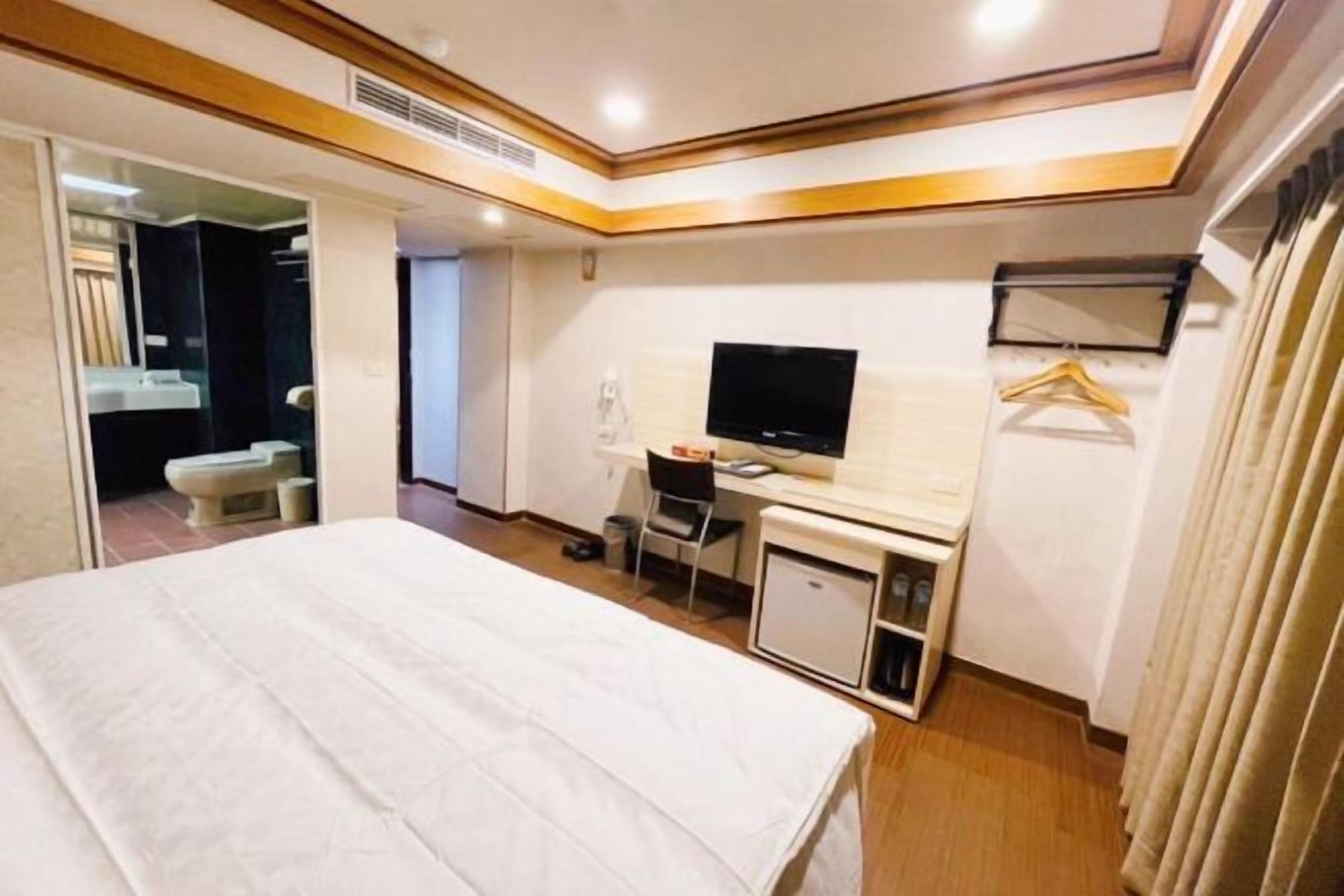 Luxe beddengoed, een bureau, gratis wifi, beddengoed