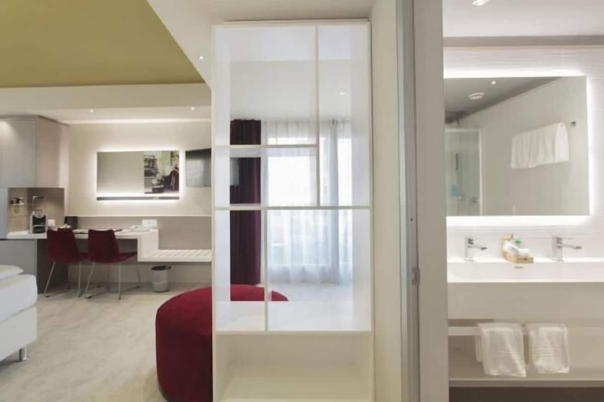 Bathroom | Shower, free toiletries, hair dryer, slippers