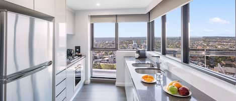 2 Bedroom Luxury Suite | Private kitchen | Full-sized fridge, microwave, stovetop, dishwasher