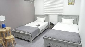 Basic Twin Room, 2 Twin Beds | Bathroom | Shower, free toiletries, hair dryer, towels