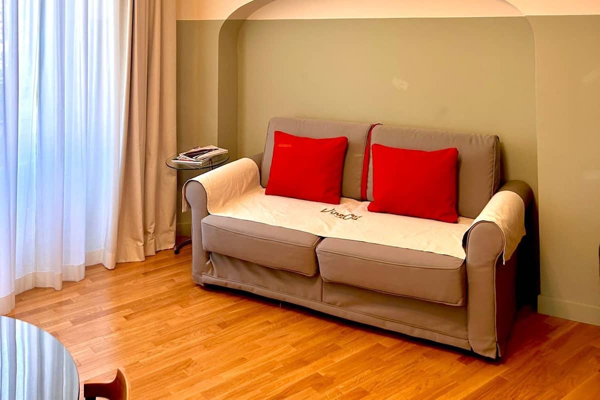 Deluxe Apartment | Living area | 43-inch Smart TV with satellite channels, TV