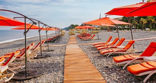 Private beach, beach cabanas, sun-loungers, beach umbrellas