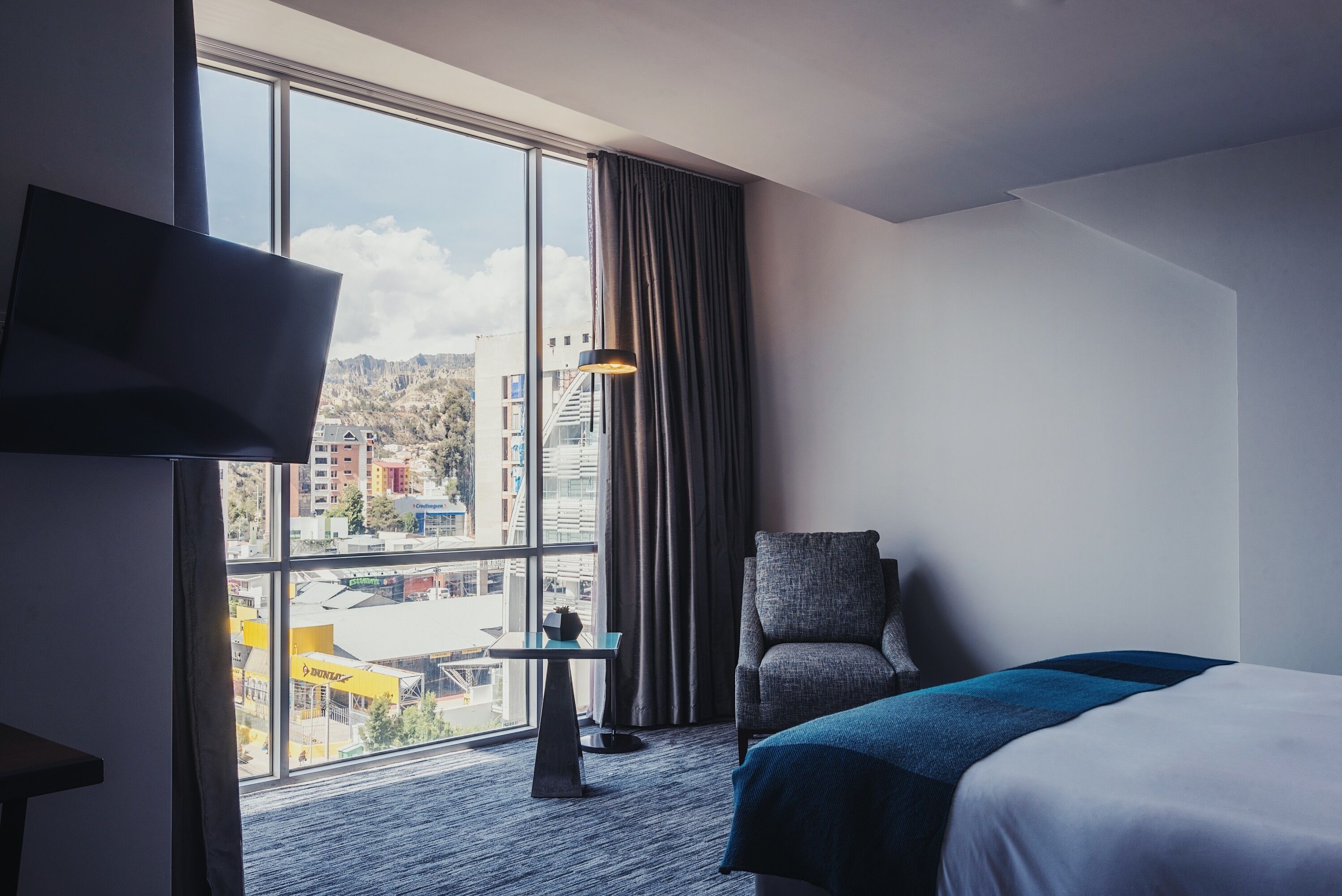 deluxe room | down duvets, minibar, in-room safe, desk