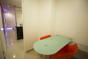 Double Room (Atracion) | Living area | LED TV - Dom Suites - Adults Only (Salvador)