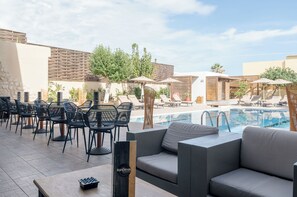 Outdoor pool, pool umbrellas, pool loungers