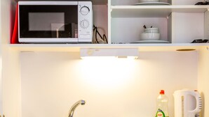 Chambre simple | Cuisinette privée