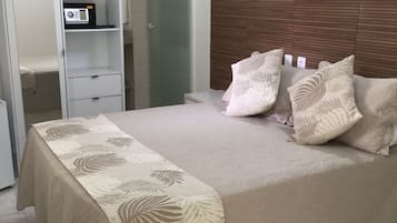 Quarto casal superior | Roupas de cama premium, camas Select Comfort, frigobar