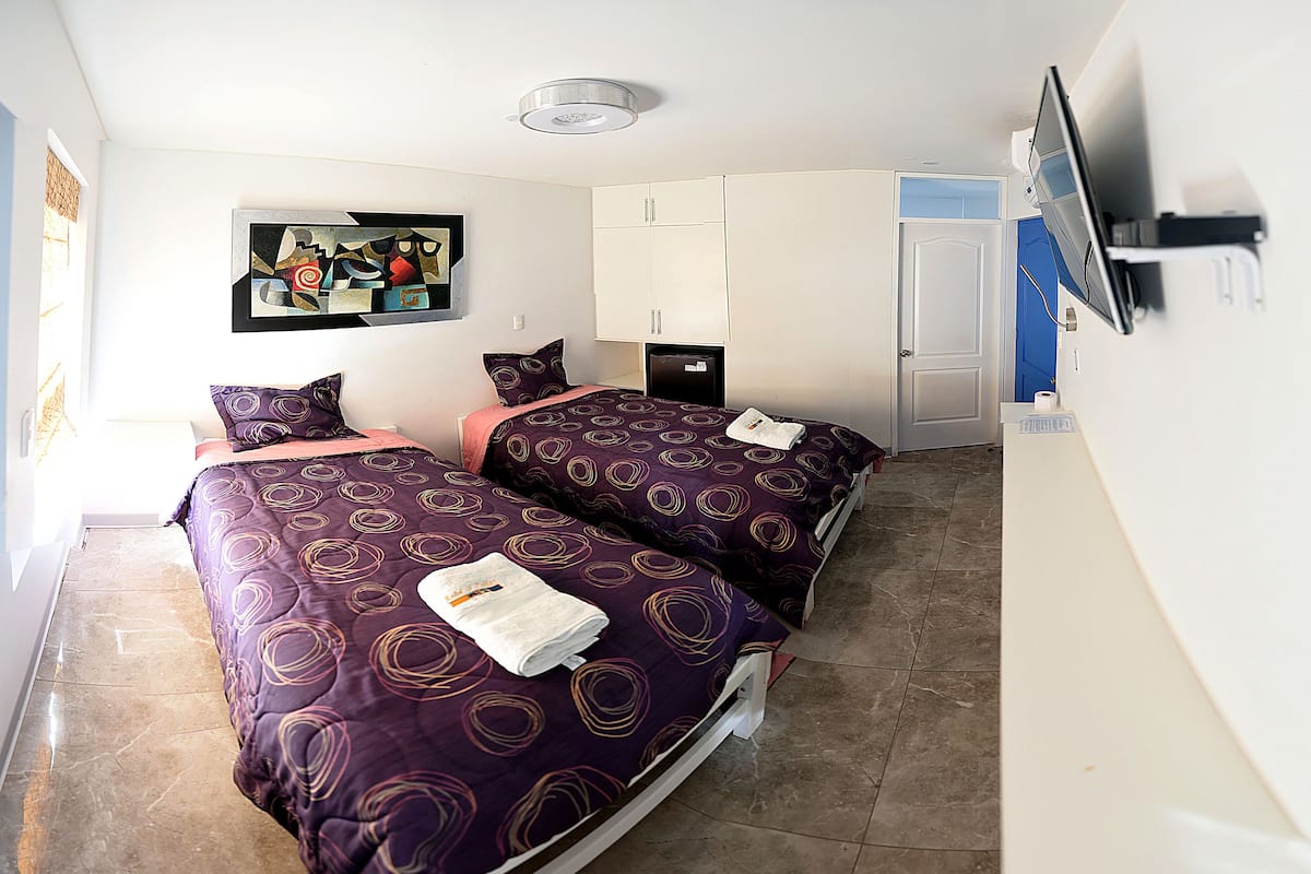 Doppia familiare, 2 letti singoli | 2 camere, minibar, con stile personalizzato, con arredamento individuale