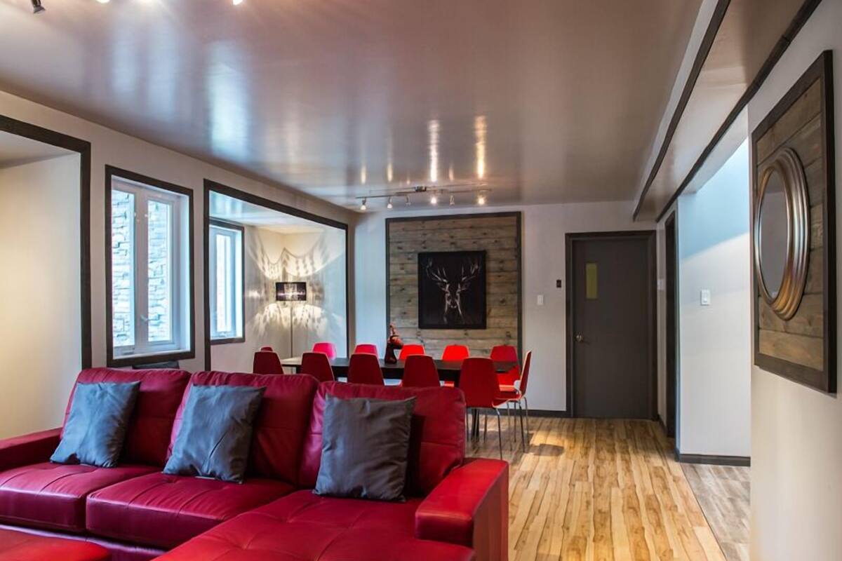 Loft Deluxe, 2 habitaciones, vista al resort | Área de sala de estar | Televisión de pantalla plana