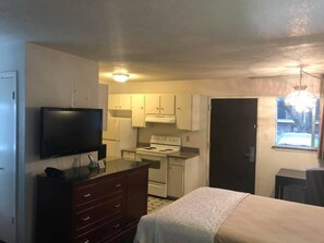 40-inch flat-screen TV with cable channels, TV