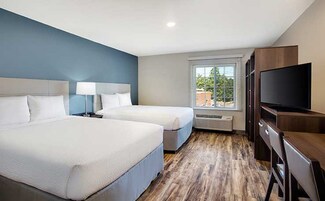 Room, 2 Queen Beds, Accessible, Non Smoking | Desk, laptop workspace, iron/ironing board, free WiFi