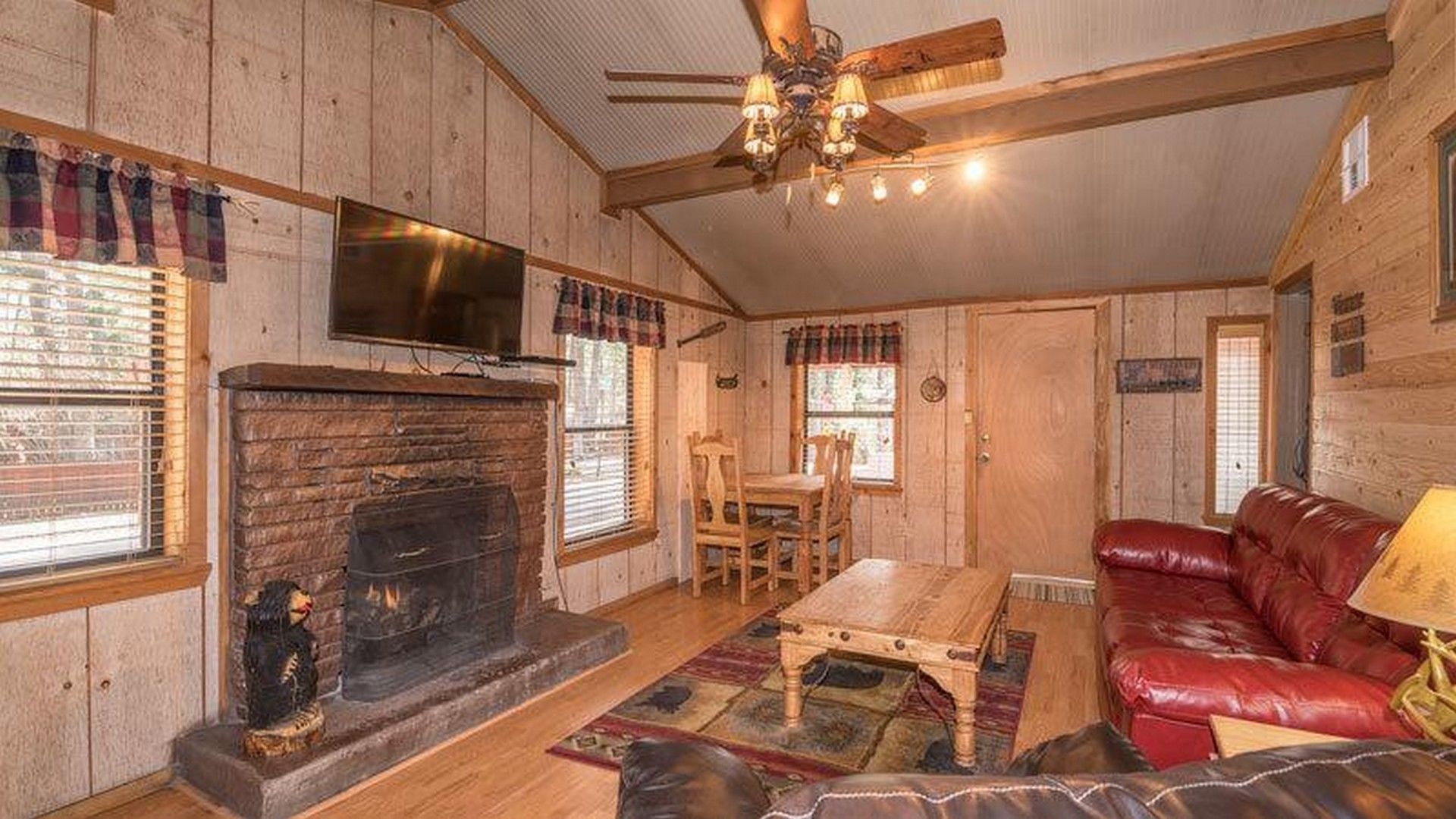 Raven Cabin | Living room | 40-inch flat-screen TV with digital channels, TV, fireplace