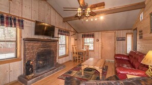 Raven Cabin | Living room | 40-inch flat-screen TV with digital channels, TV, fireplace