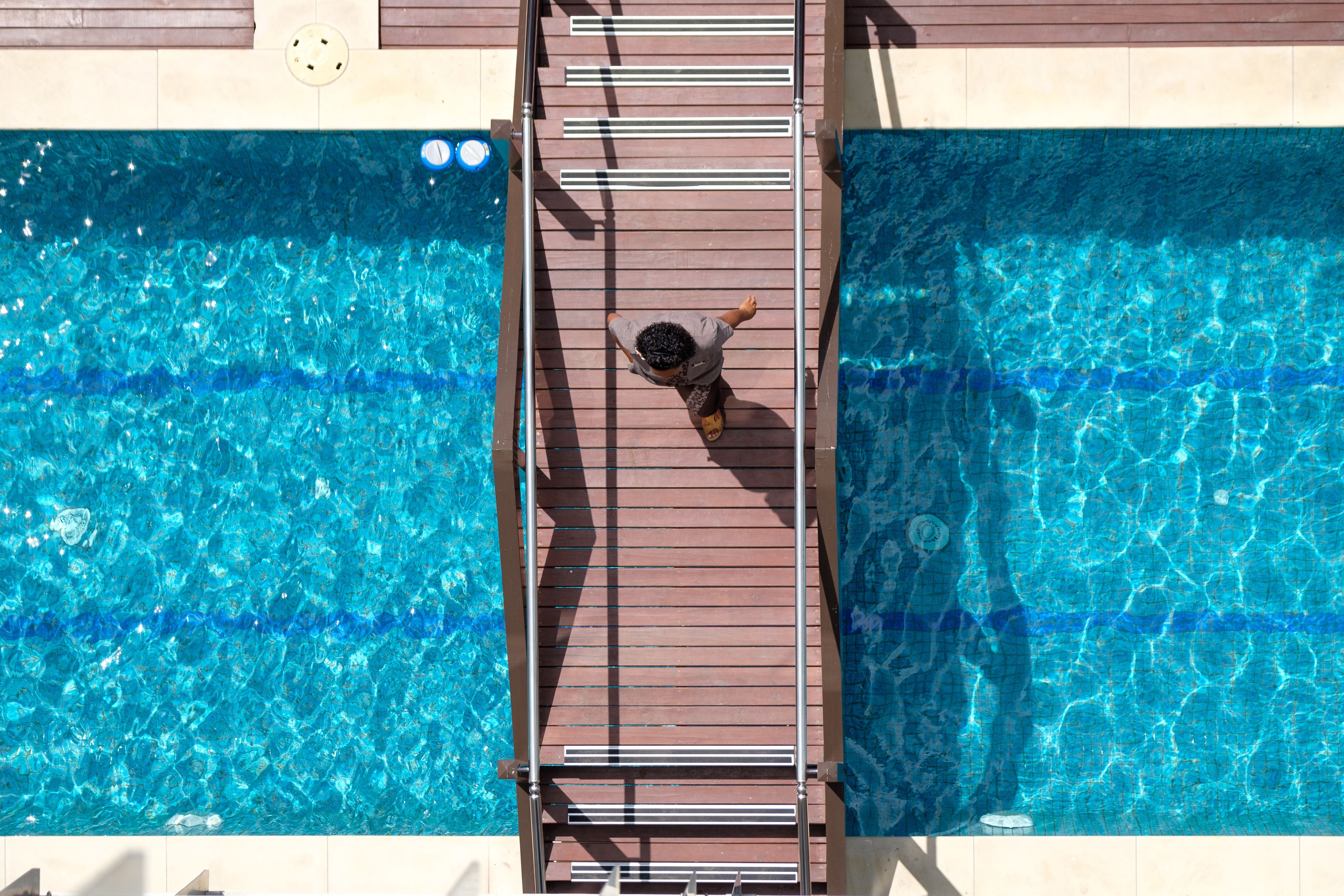 outdoor pool, pool umbrellas, pool loungers