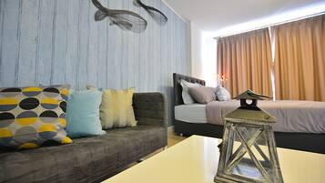 1 Bedroom Garden View | Living area | Flat-screen TV