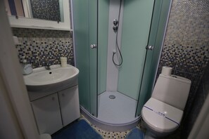 Shower, free toiletries, hair dryer, slippers