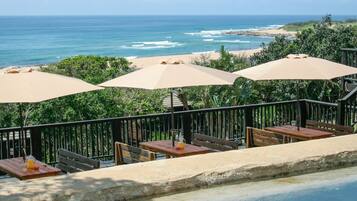 Breakfast, lunch, dinner served; international cuisine, pool views