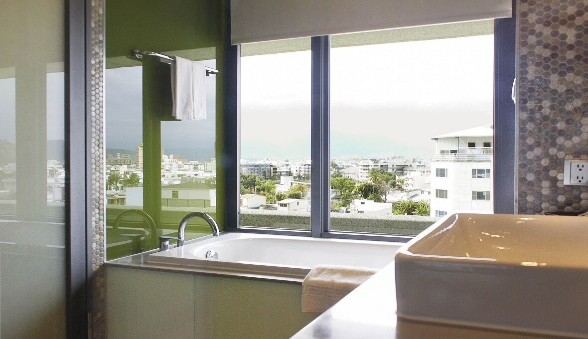 hair dryer, slippers, bidet, towels