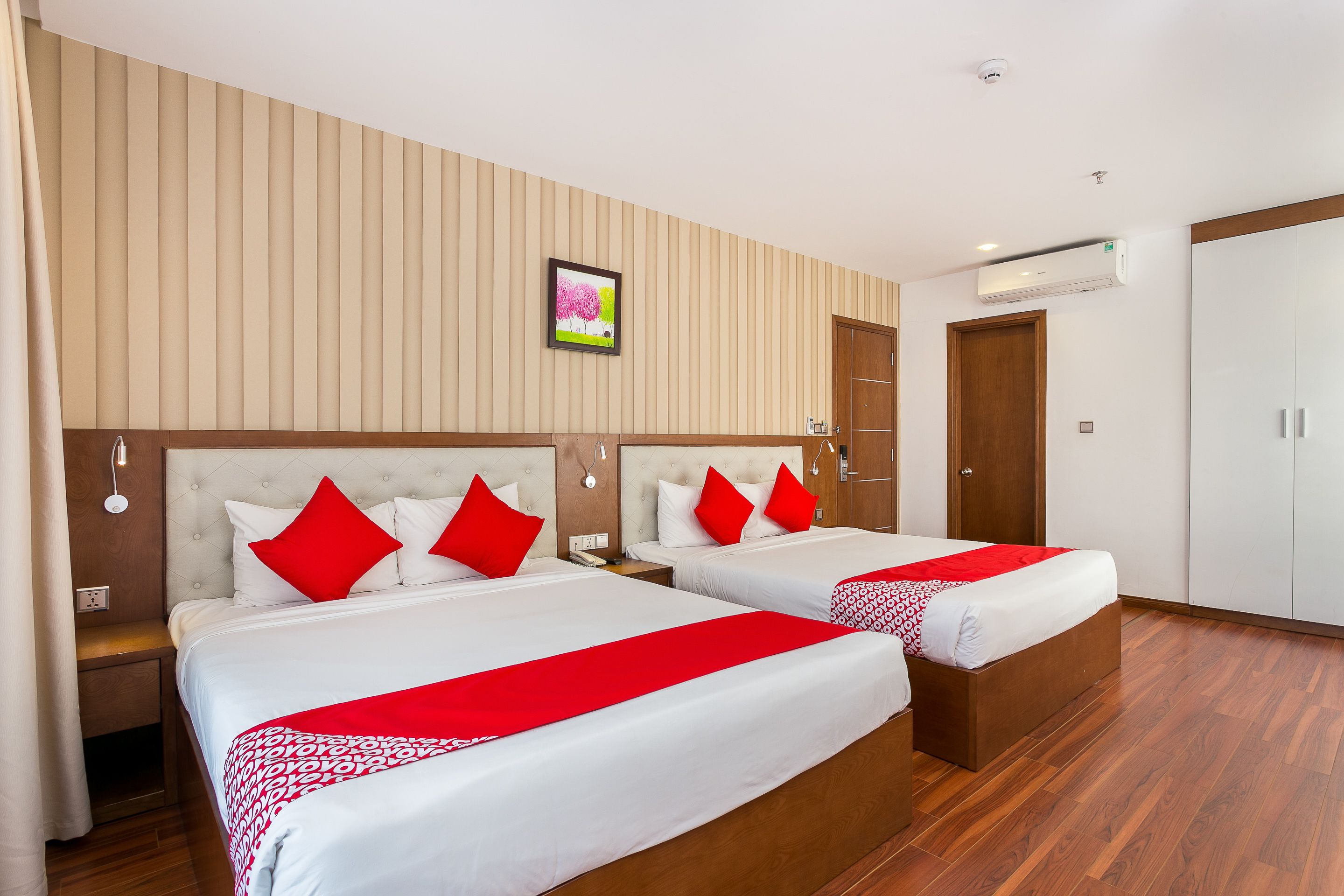 deluxe quadruple room, 2 queen beds | 1 bedroom, minibar, desk, laptop workspace