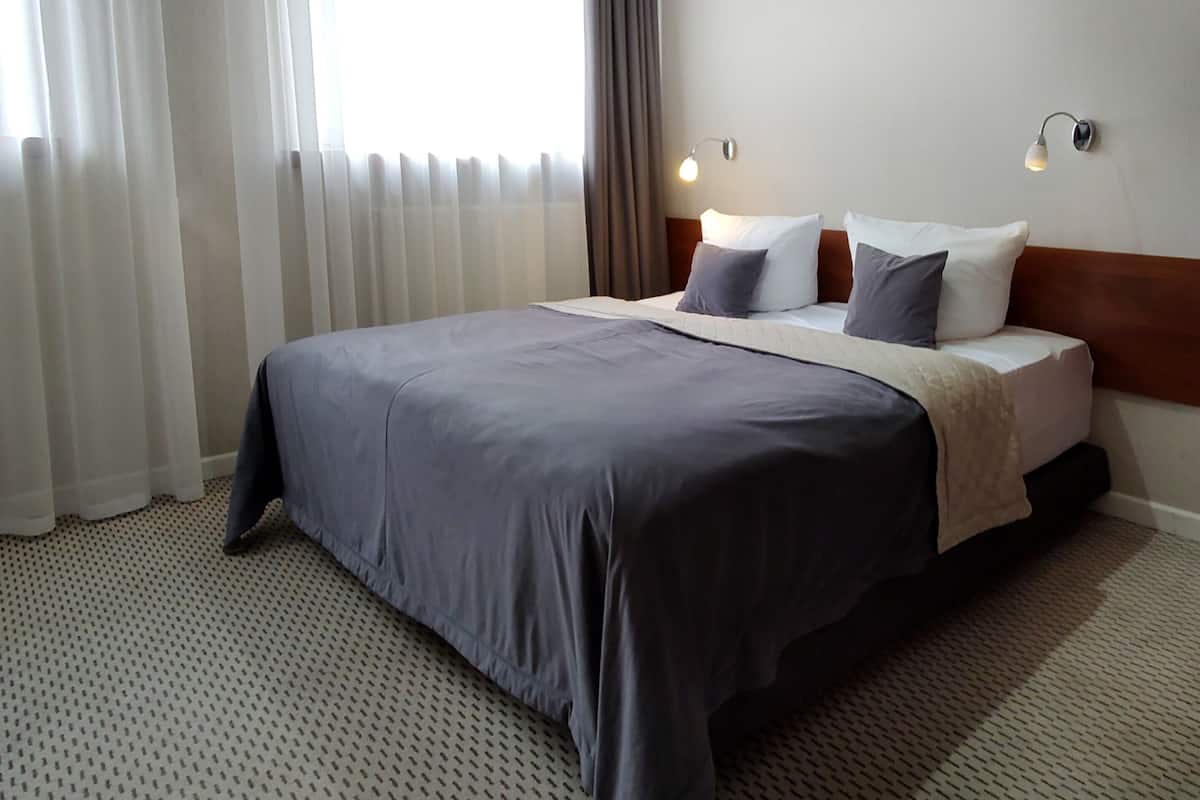 Economy Double or Twin Room | In-room safe, desk, iron/ironing board (on request), cribs (free)