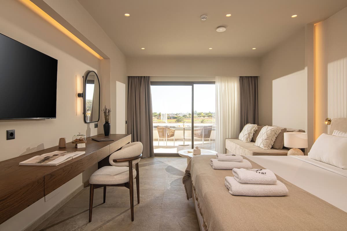 Junior Suite, Balcony | In-room safe, desk, laptop workspace, soundproofing
