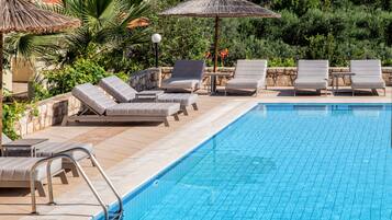 Seasonal outdoor pool, sun loungers
