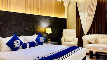 Kamar Double Eksekutif | Selimut bulu angsa, brankas, meja kerja, dan ruang kerja ramah laptop