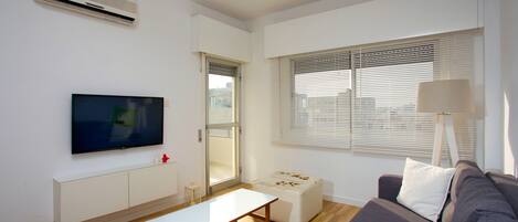 City Apartment | Living room | 42-inch flat-screen TV with cable channels, TV