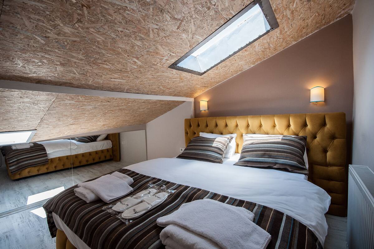Penthouse | Premium bedding, desk, soundproofing, iron/ironing board
