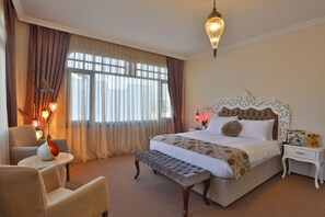 Habitación Deluxe | Minibar, caja fuerte, escritorio y cunas gratuitas