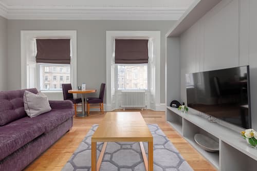 Classic Studio, 1 Bedroom | Living area | Flat-screen TV