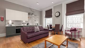 Classic Studio, 2 Bedrooms | Living area | Flat-screen TV