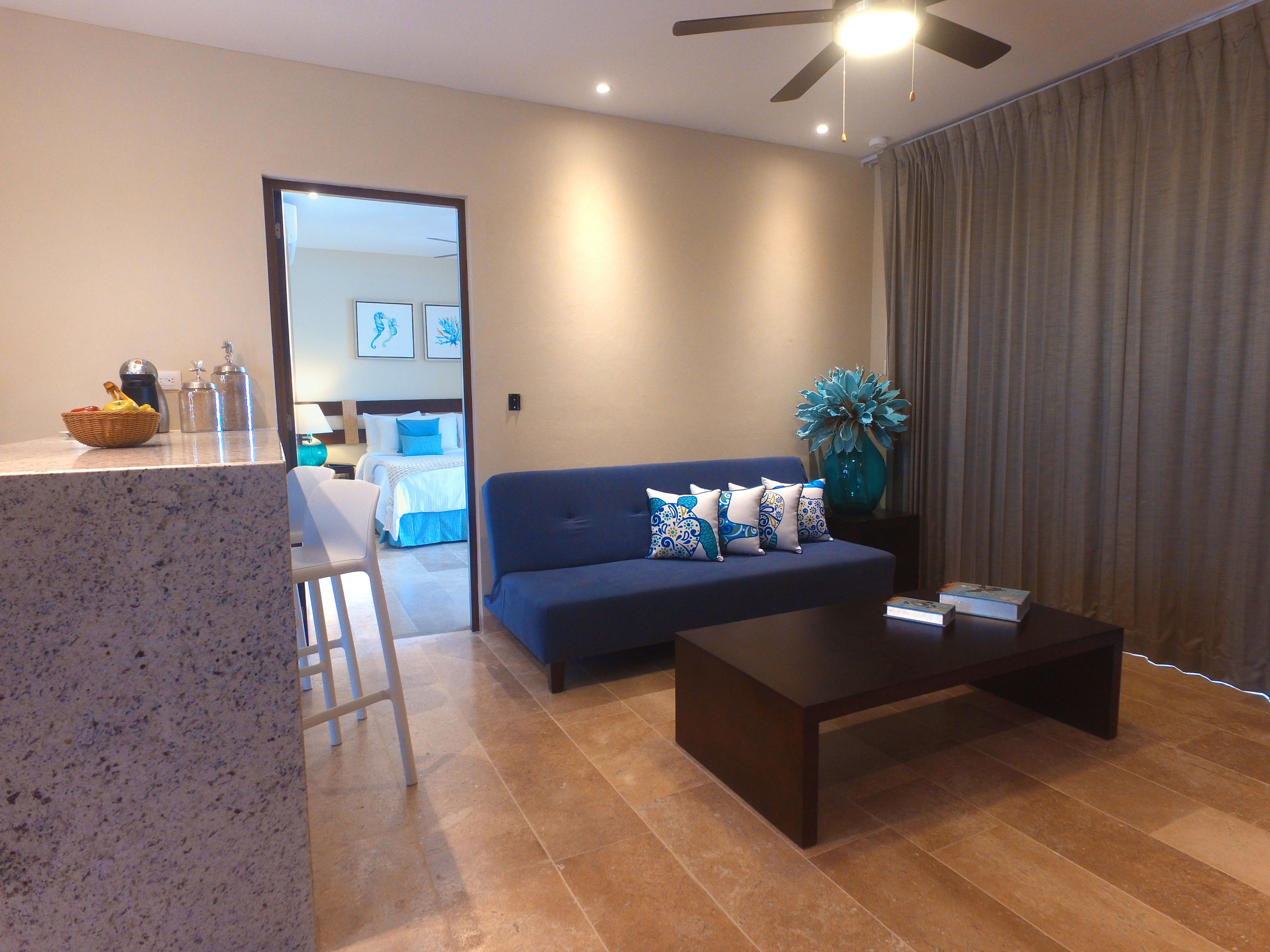 deluxe villa, 1 king bed | living room | 43-inch led tv with satellite channels, tv