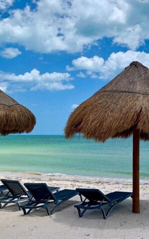 On the beach, white sand, free beach shuttle, motor boating