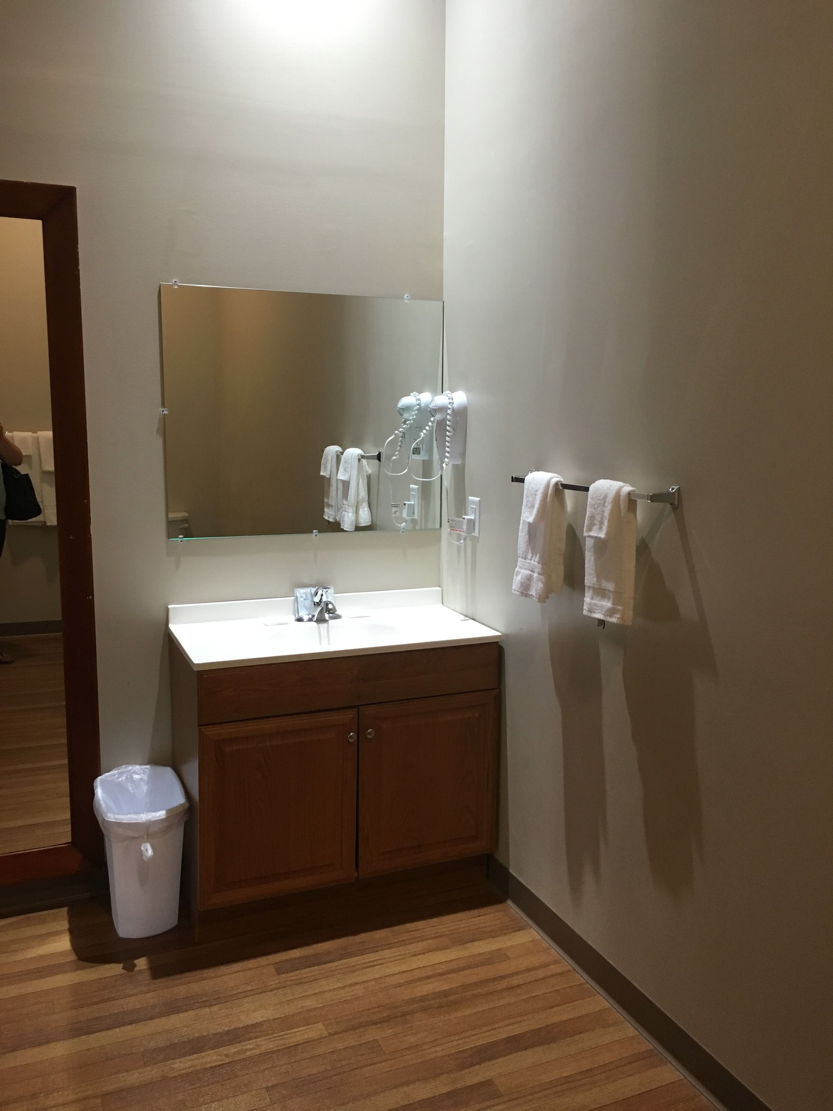 deluxe room, multiple beds, refrigerator, mountain view | bathroom | combined shower/bathtub, rainfall showerhead, free toiletries