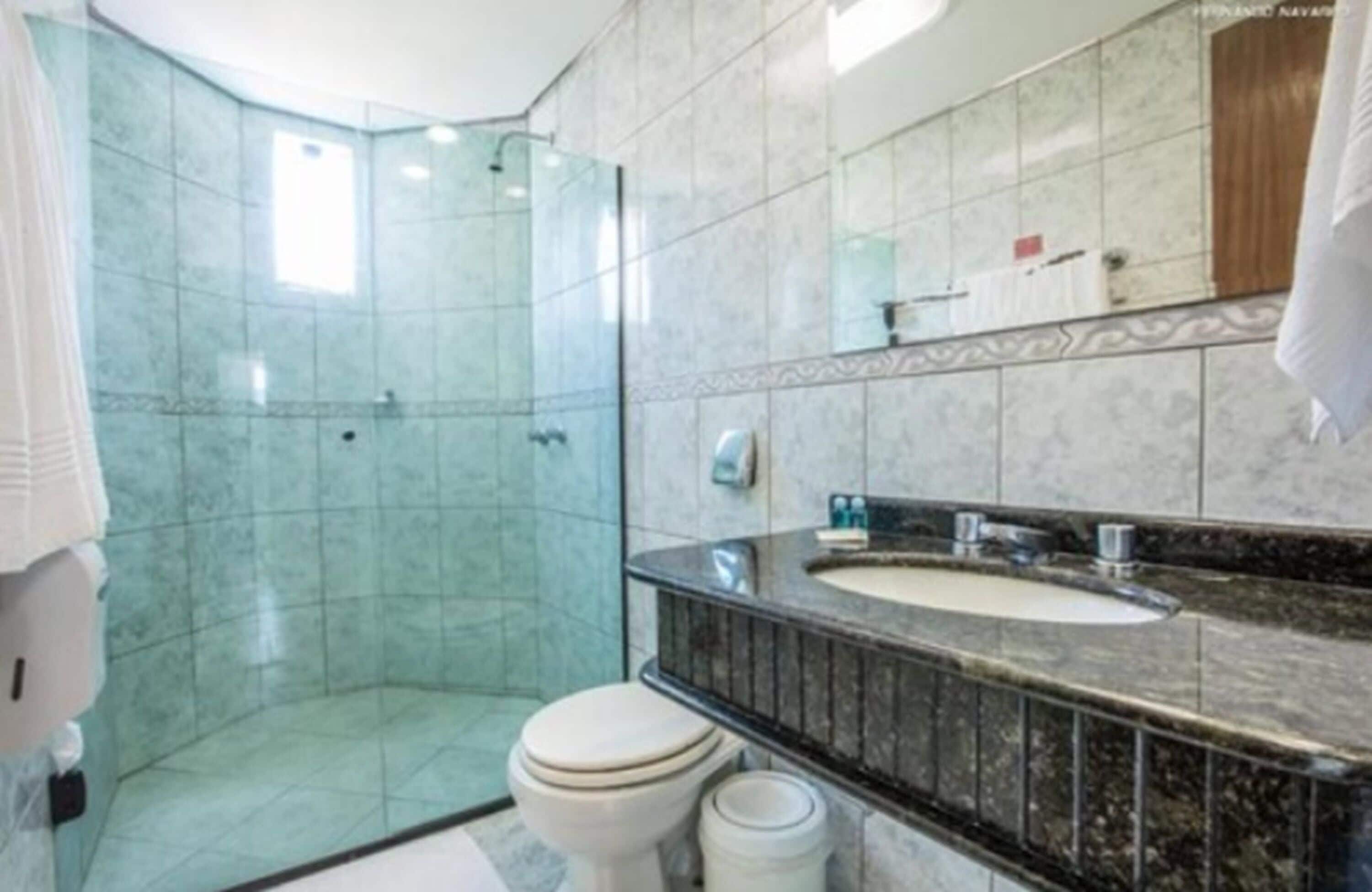 standard double room | bathroom | shower, free toiletries, hair dryer, towels