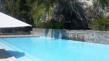 Outdoor pool, pool umbrellas, pool loungers