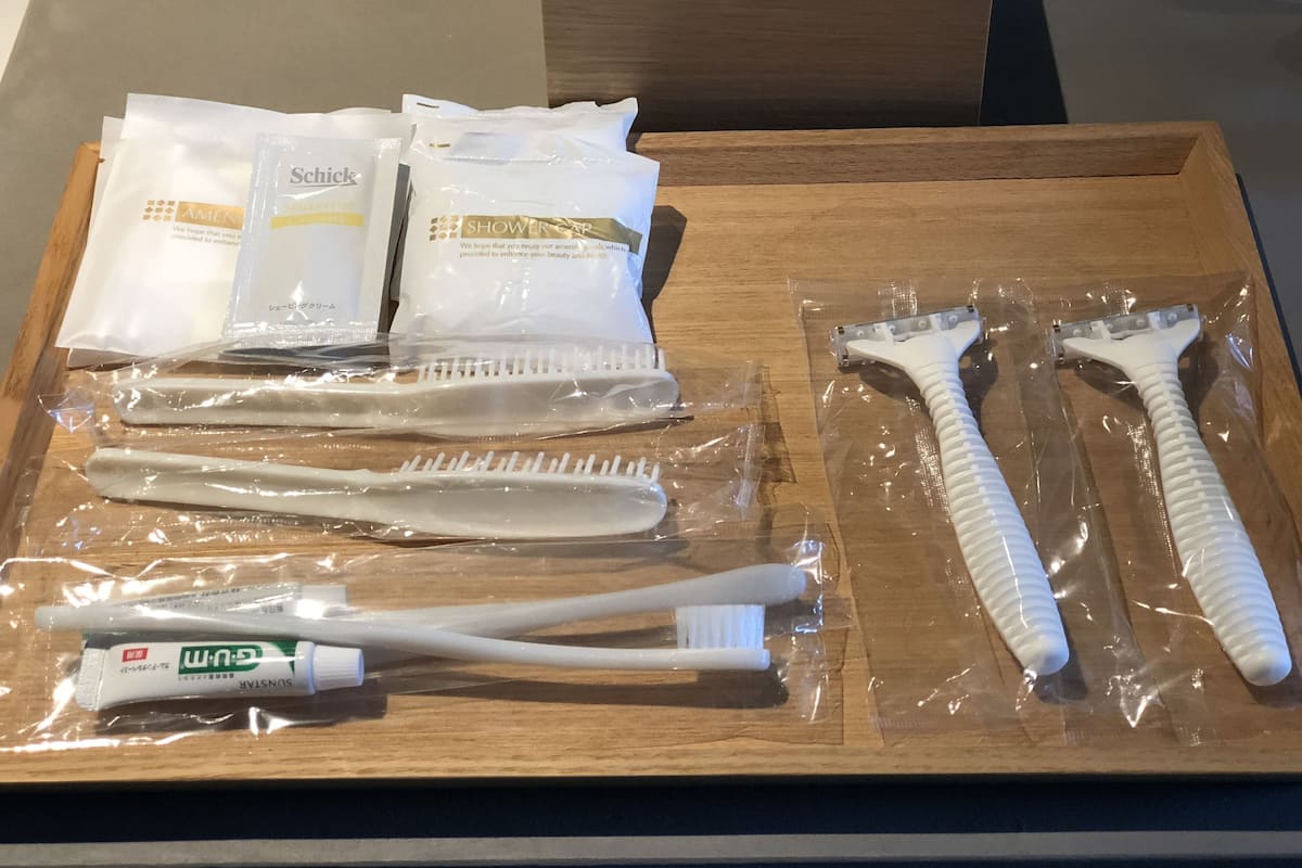 eco-friendly toiletries, hair dryer, slippers, electronic bidet