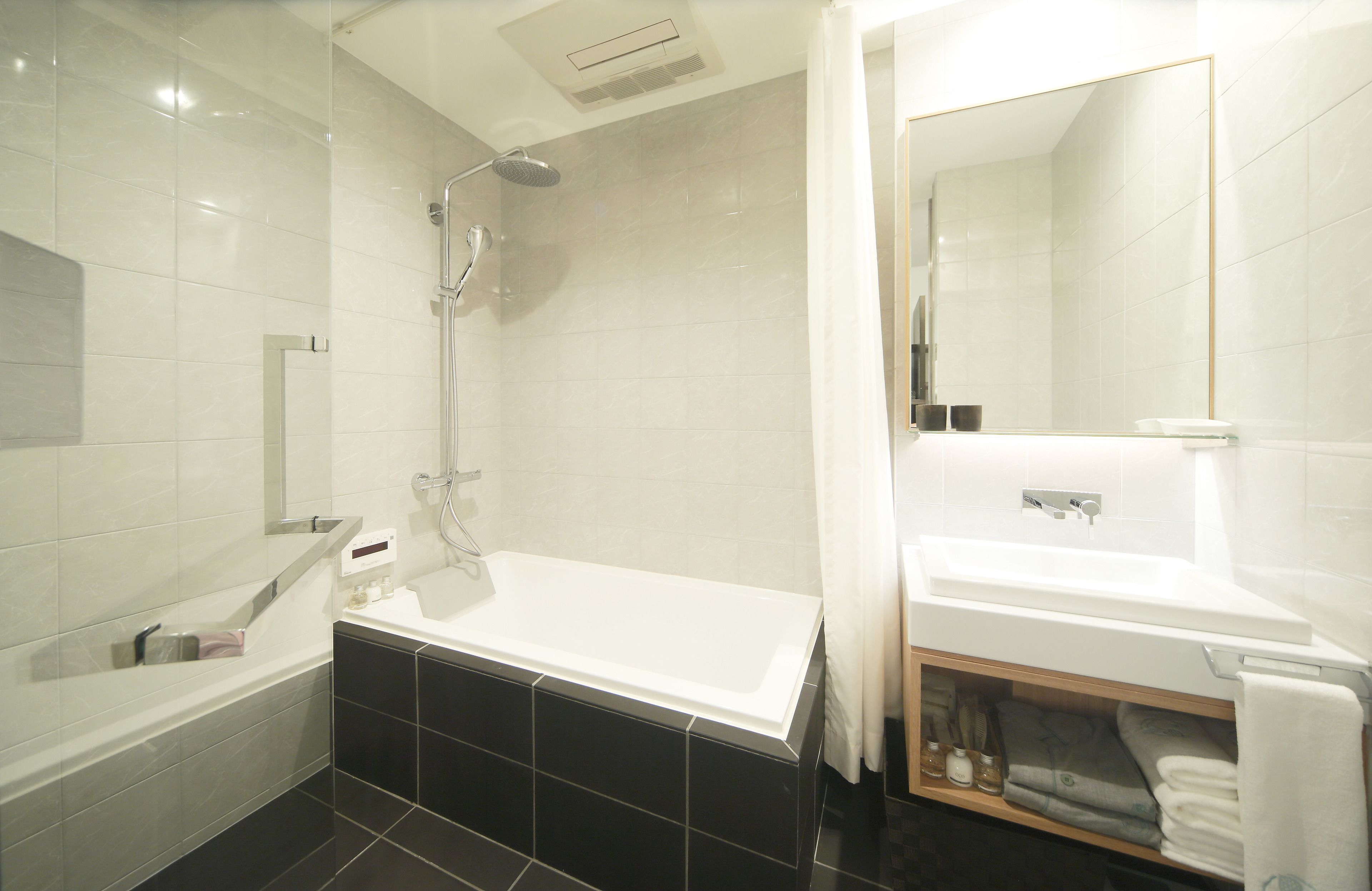 eco-friendly toiletries, hair dryer, slippers, electronic bidet