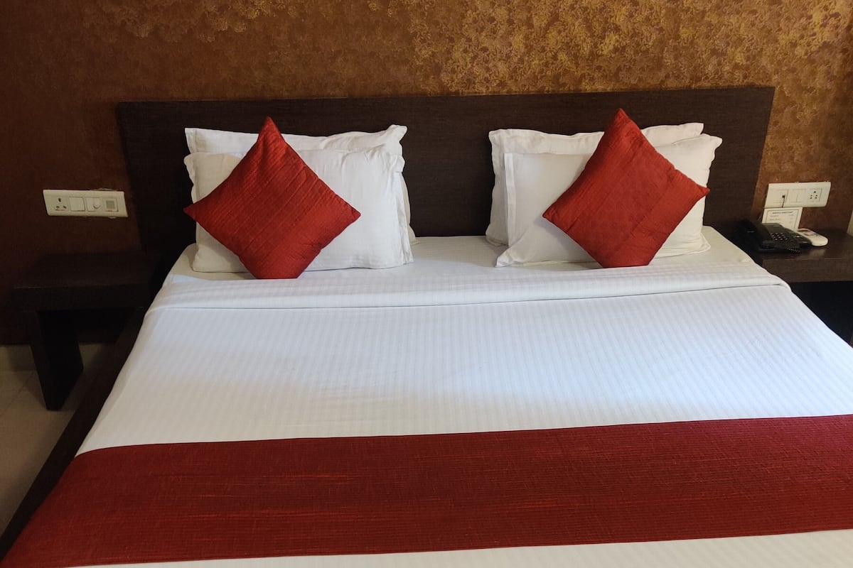 Premium bedding, desk, blackout drapes, iron/ironing board