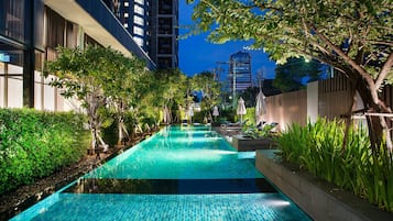 Outdoor pool, pool umbrellas, sun loungers