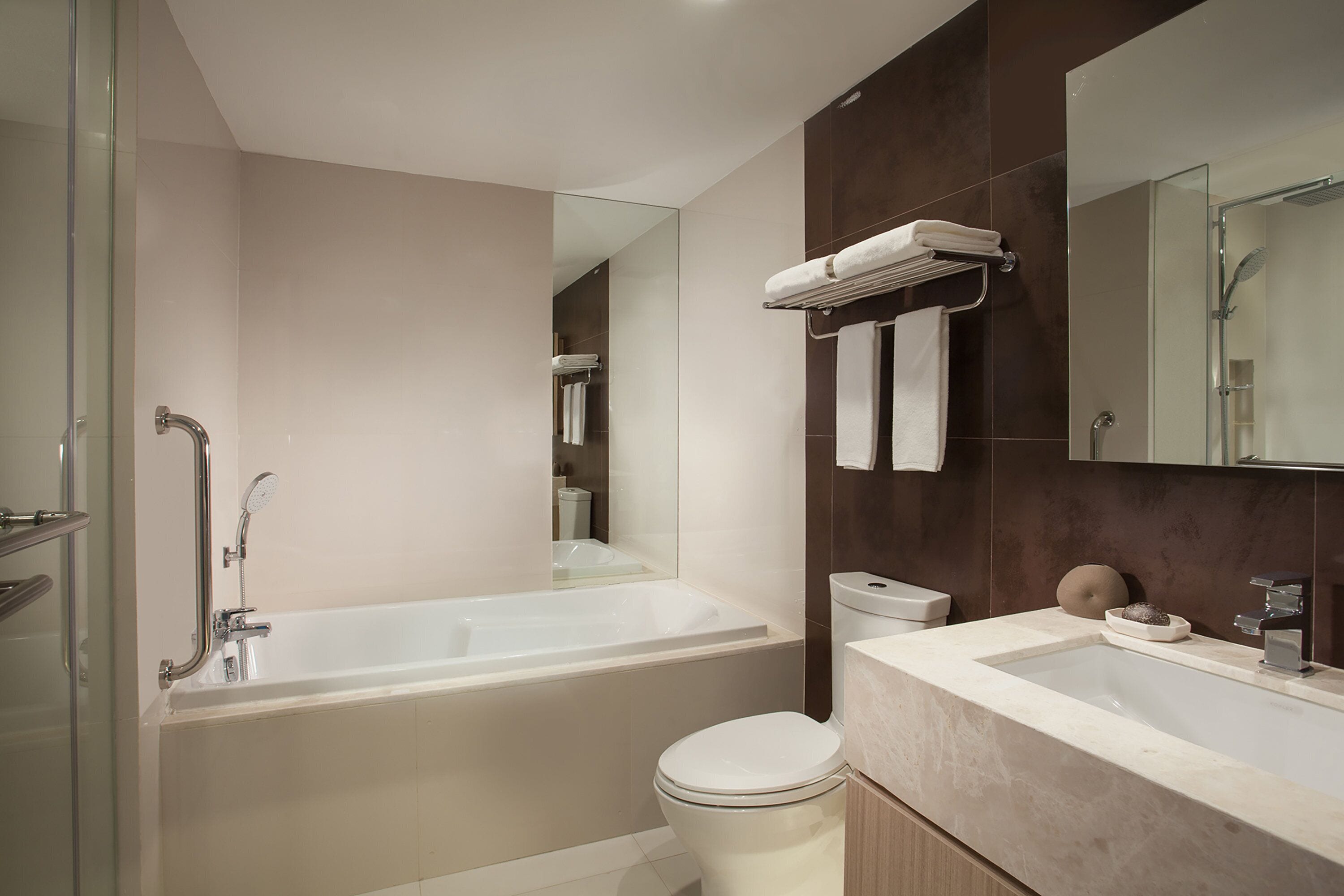 eco-friendly toiletries, hair dryer, bidet, towels