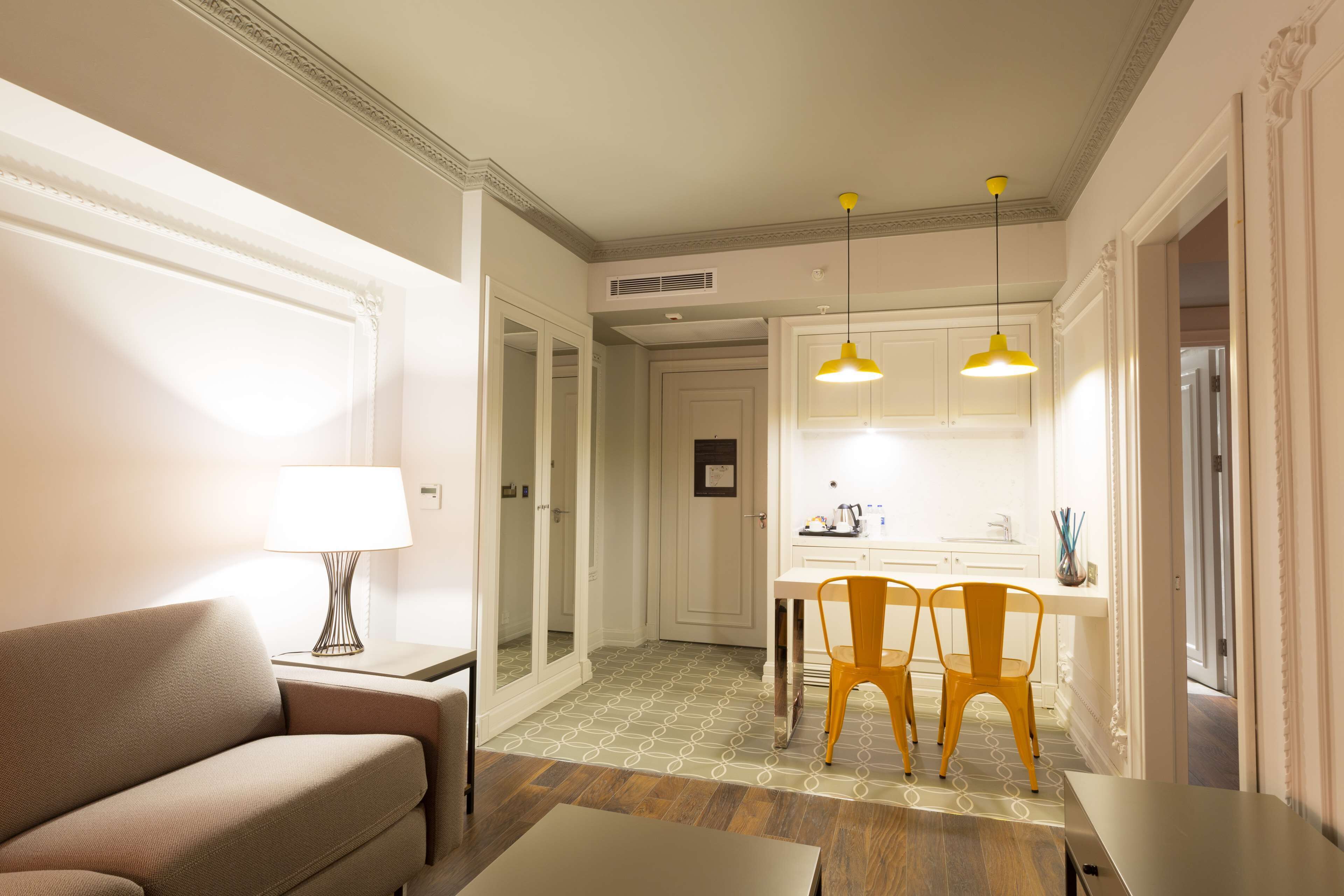 junior suite, 1 king bed | living area | lcd tv