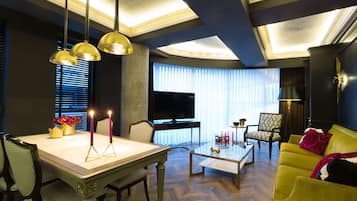 Suite, 1 Bedroom | Living area | LCD TV