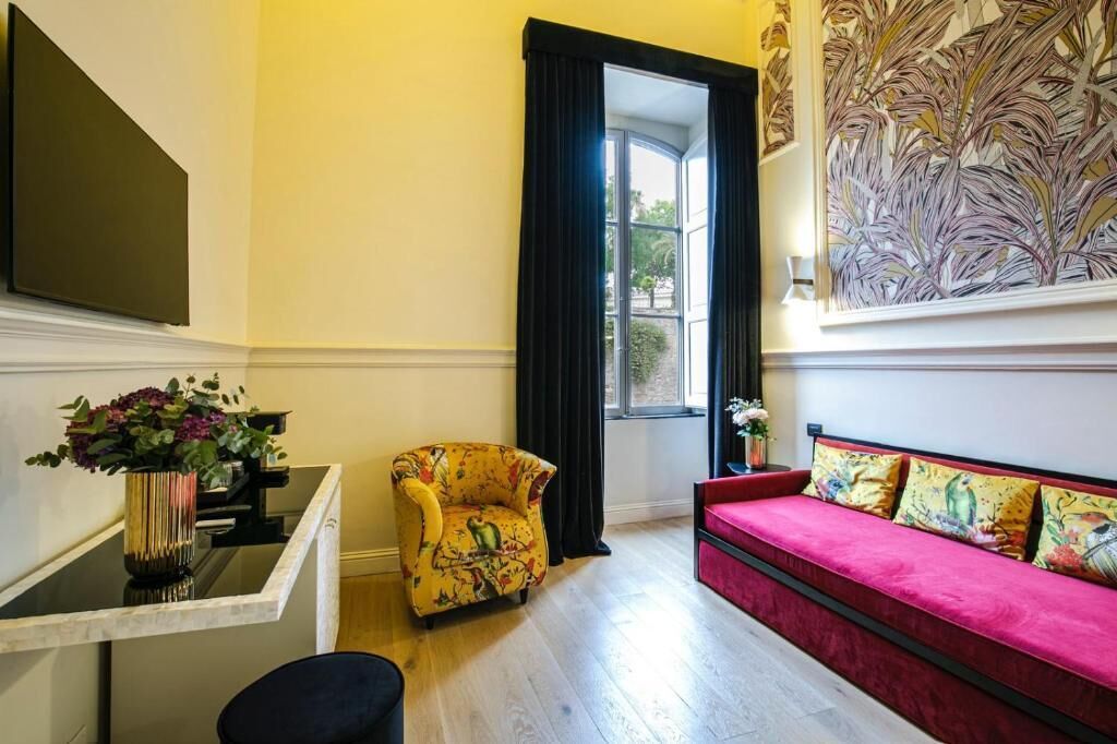 Panoramic Suite | Living area | 42-inch LCD TV with digital channels, TV